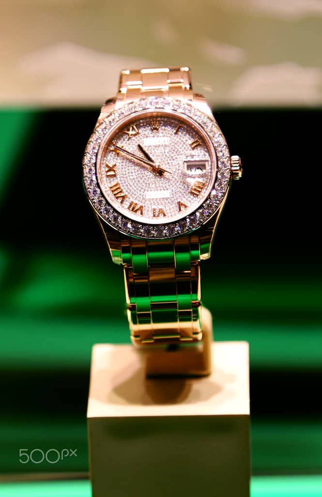 Close-up of a polished Rolex case and bracelet
