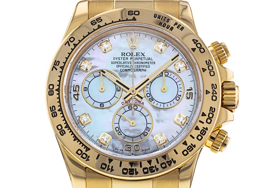 A modern Rolex Daytona in yellow gold with mother-of-pearl dial